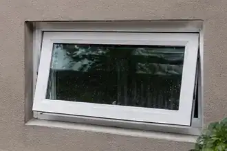 Top-hinged awning window open outward from the bottom for controlled ventilation.